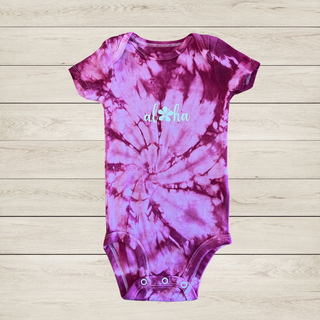 'Aloha' with flower baby onesie 6-9 months in red.
